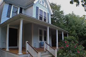 Building a deck is an investment, so you'll want to get it right from go. Victorian Wrap Around Porch Vintage Porch Furniture Blue House White Trim Black Shutters Red Door Refinished Deck Olloclip Victoria Elizabeth Barnes