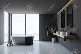 Buy white floor & wall tiles and get the best deals at the lowest prices on ebay! Interior Of Modern Bathroom With Gray Tile Walls Stone Floor Stock Photo Picture And Royalty Free Image Image 117955169