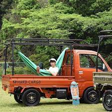 少しずつ暖かくなってきましたね hardocargo軽トラ ハンモックでゆっくり過ごすのはいかがでしょうか モデルは弊社グループjunglechikenのイケメンスタッフ hardcargo ハードカーゴ 軽トラ アゲトラ 軽トラカスタム 軽ト mini trucks trucks truck camping