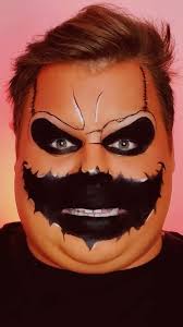 Transforming into a Jack-O-Lantern Makeup Look