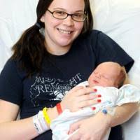 Boy arrives early to become first baby of '12