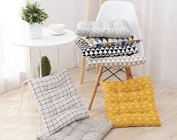 Seat cushions are used to provide comfort and to give relief to some physical conditions and pain. Dining Chair Cushion Etsy