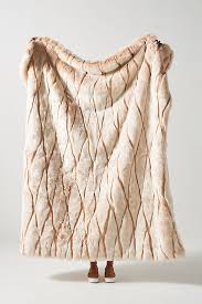 They're more low maintenance than they appear. Alpine Faux Fur Throw Blanket Anthropologie