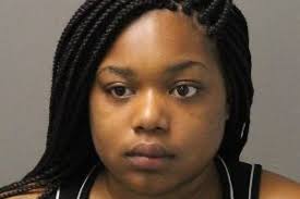 Clerk, boyfriend charged with staging robbery of Elmhurst gas station