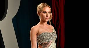 The academy award nominated actress, 35, wore a custom pewter oscar de la renta draped gown featuring a fringe beaded bodice and sweeping train. Scarlett Johansson Shows Off Tattoos In Oscars Party 2020 Dress The Atlanta Business Journal