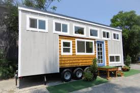 28 Ft Tiny House With Board And Batten Siding And Cedar Accent Tiny House Builders Tiny House Village Tiny House Blog