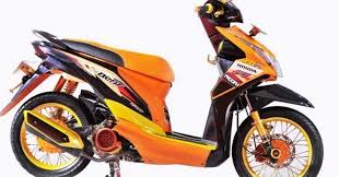 Belum ada peningkatan dari segi fitur atau performa, hanya pilihan warna baru. Konsep 30 Modifikasi Motor Beat Fi Warna Orange