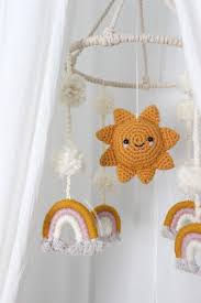 Grab some macrame string and let's get started! How To Make A Macrame Rope Rainbow Wall Hanging Wonder Forest In 2021 Crochet Baby Mobiles Crochet Mobile Rainbow Diy