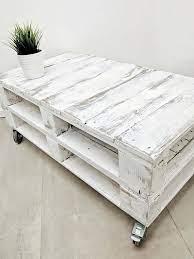 I used watered down white paint to white wash the pallets. Distressed Pallet Coffee Table Lemmik In Aged White Finish Made Of Reclaimed Timber Whitewashed S Pallet Coffee Table Pallet Coffee Table Diy Coffee Table Wood