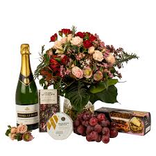 Stunning flowers accompanied with wine are sure to delight. Pure Indulgence Gift Basket Wine Cheese Crackers Free Flower Gift Delivery Auckland