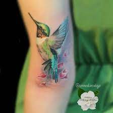 41 Large And Small Hummingbird Tattoos Hummingbird Tattoo Cage Tattoos Tattoos