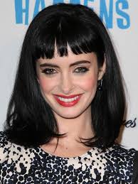 Very impressive look with extraordinary colors. Krysten Ritter Black Medium Straight Hairstyles With Blunt Bangs Popular Haircuts