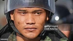 A Thai soldier stands guard