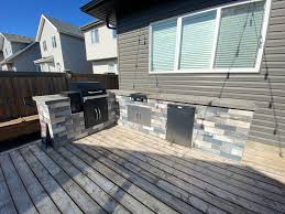 The model signifies the big green egg's main function. It S Done Outdoor Kitchen With A Cast Iron Country Smokers Griddle Fridge And Storage Finished With Concrete Countertops Traeger