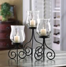 As a perfect addition to any candlestick , candelabra, wall sconce, or candle plate, these hurricane candle shades work excellently as sheilds that protect open flames on. Wrought Iron Hurricane Candle Holders Ideas On Foter
