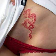 Fine Line Dragon Tattoo In Red Ink