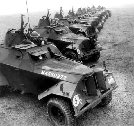 British Humber Scout Cars with mounted Bren MG's and Anti-Tank Rifles.