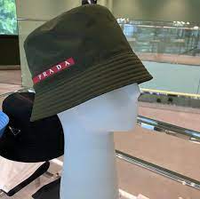 145 Likes 1 Comments Toych3st Lifeofachloegirl On Instagram Usa Personalshopper Pradabuckethat Prada Bucket Hat Baseball Hats Trucker Hat