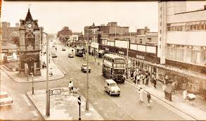 Bexleyheath, Broadway and Marketplace. Circa 1970. Coronation Clocktower to  the left. Hides and the Lord Bexley to the right.