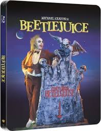 Gracias a la negligencia de un lindo perrito, las recién casadas geena davis y alec baldwin mueren en un extraño accidente automovilístico. Beetlejuice 2