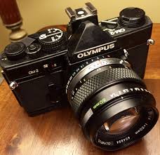 Olympus Om 2 1975 It Was The First Camera To Offer A Ttl Direct Metering System For Film Named Auto Dynamic Metering Vintage Cameras Vintage Camera Olympus