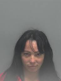 Scamma tries to burn cash in police raid