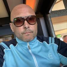 Robbie Williams...the most overrated "singer" in history.... absolute shit.