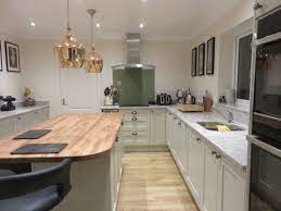 Gray would work nicely from what i can see in your photos. Painted Mussel Shaker Kitchen Installed By The Gallery Fitted Kitchens