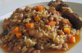 Jollof rice, salad and chicken Jollof Rice And Beans With Carrots Wives Connection Recipes