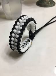 Black And White Bracelet Sanctified Paracord Bracelet In Black And White Paracord Bracelets Macrame Bracelet Patterns Bracelet Patterns