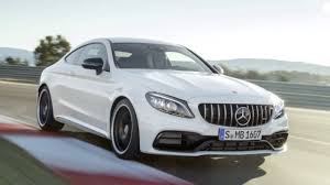 Range Topping Mercedes Amg C 63 Revealed At The New York Auto Show Mercedes Amg Mercedes C63 Amg Amg Car
