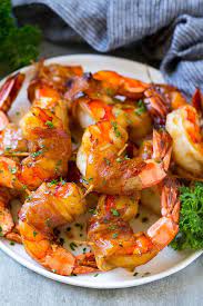 These Bacon Wrapped Shrimp Are Coated In A Sweet And Savory Glaze And Broiled To Perfecti Bacon Wrapped Shrimp Wrapped Shrimp Recipes Bacon Wrap Shrimp Recipes