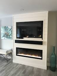 Personally, i would not mount a tv over a fireplace period. Shiplap Entertainment Centre With Fireplace Home Fireplace Fireplace Entertainment Center Fireplace Entertainment