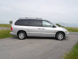 Image result for Bright Silver 2000 Caravan