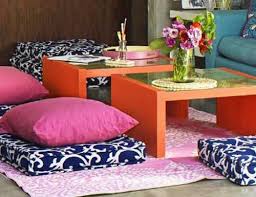 I Love The Bright Contrast Of Black And White With Pops Of Orange And Hot Pink Colors In This Multi Use Dining Living Area Floor Seating Floor Pillows Flooring