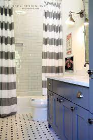 If you already have great color in your bathroom, this shower curtain will look more personal while still letting your other design choices take center stage. Double Gray And White Stripe Shower Curtains Painted Vanity Gray But Looks Blue Bathrooms Remodel Bathroom Makeover Bathroom Decor