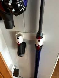 This is an accessory holder/mount that clips onto the wand of the dyson v7/v8 motorhead wand. Dyson V8 Wall Mount Stlfinder