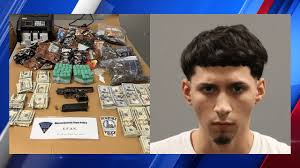 Firearms, narcotics seized in Dwight Street raid