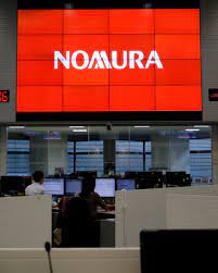 Japan's Nomura flags $2 bln loss at U.S. unit, cancels bond issue | Reuters
