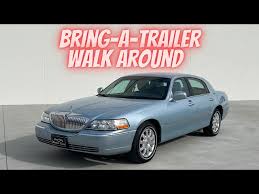 Image result for Light Ice Blue 2006 Town Car