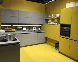 Yellow cabinets and grey walls, pale yellow floors and dark grey counter tops (maybe even granite). Grey And Yellow Kitchen Cabinets Thebestwoodfurniture Com