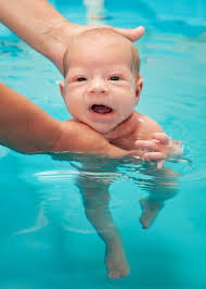 8 Tips For Teaching Your Kid How To Swim Like A Fish This Summer Teach Baby To Swim Baby Swimming Lessons Baby Swimming