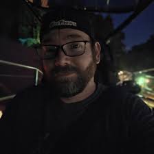 What movie is playing in Dogwood park this Friday night?