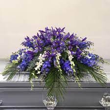 Express your condolences with beautiful fresh flowers. Blue Casket Spray Hollywood Forever