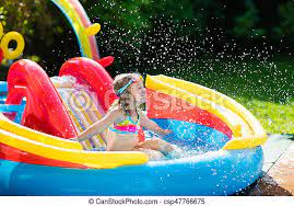 The swimming pool does not have to be a place purely for doing laps and staying fit. Child In Garden Swimming Pool With Slide Child Playing In Inflatable Baby Pool Kids Swim Slide And Splash In Colorful Canstock