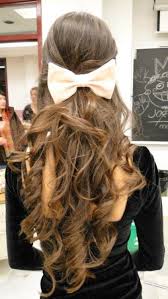 Here's everything you need to know about growing and caring for long hair plus cool haircuts and hairstyles for all hair types. Sock Bun Curls Luxurious Long Waves With Bow Hairstyles Weekly
