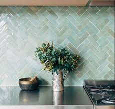 The Soft Green Glass Tile Back Splash Adds Serenity To This Kitchen Space Green Kitchen Backsplash Glass Tiles Kitchen Glass Tile Backsplash Kitchen