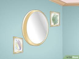 Large, decorative mirrors can be placed on the floor in a leaning position, suggests bee heinemann, home decor expert at vant wall panels. 10 Simple Ways To Decorate Around A Round Mirror Wikihow