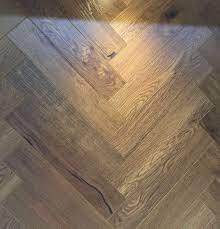 Knightsbridge Smoked Oak Herringbone Parquet Laminate Flooring 12mm Flooring Herringbone Laminate Flooring Laminate Flooring