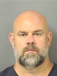 High school staffers plead not guilty to failure to report assault